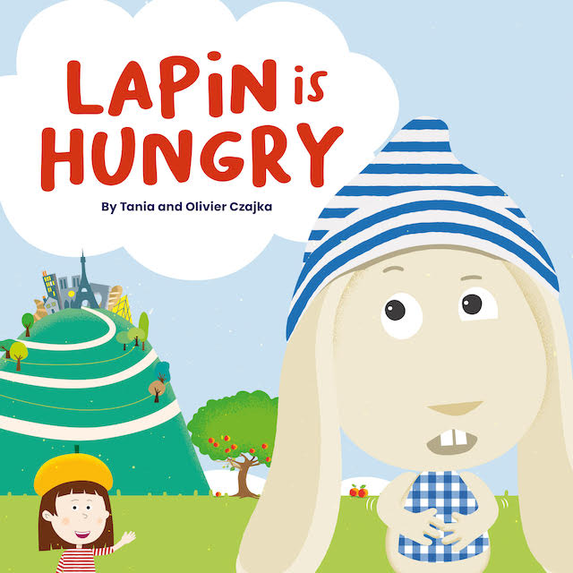 picture of the Lapin is Hungry book cover showing Lapin dressed in a blue and white striped hat with background image of a hill with French iconic symbols like Eiffel Tower, croissant, baguette at the top